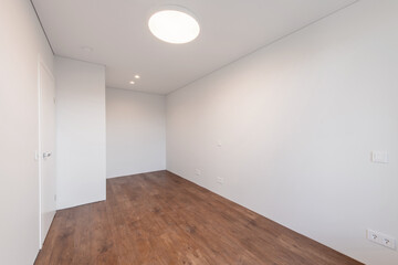 Empty white walls room corner and LED Light. Interior with empty room with white walls and wooden floor.