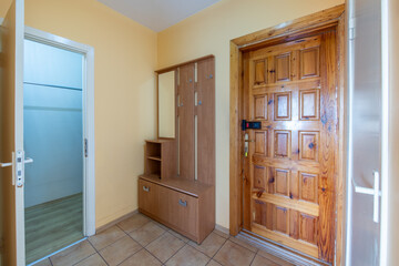 Home Corridor, Entrance Hall. Hallway. Bright Pink Walls, Hardwood Floor. LED Light on the Ceiling.