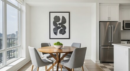 Modern dining area with abstract art and stainless steel appliances in a bright apartment