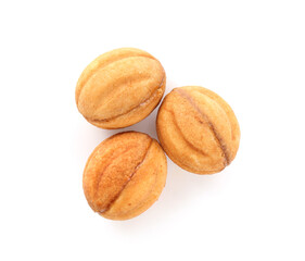 Delicious nut shaped cookies with boiled condensed milk isolated on white, top view
