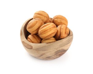 Delicious nut shaped cookies with boiled condensed milk in bowl isolated on white