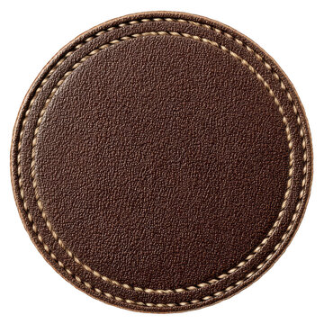 An oval brown leather patch with a pebbled texture and decorative braided stitching around the border isolated on a black background