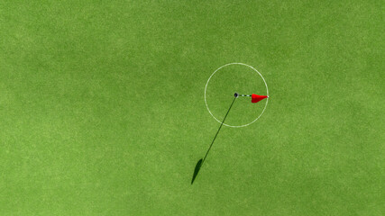 Aerial top view putting green with flag at golf course, Golf Course with putting green, Golf course sport, Green grass on golf field, fairway and putting green top view.
