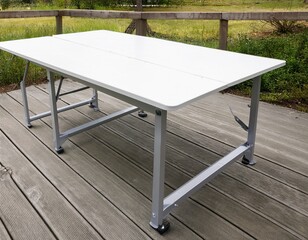 white folding table with gray metal legs perfect for events and home use