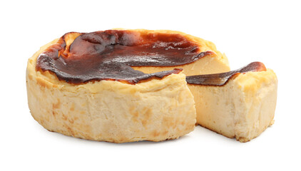 Pieces of tasty Basque cheesecake isolated on white