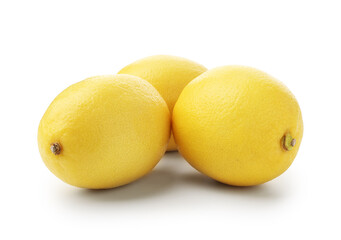 Many whole ripe lemons isolated on white