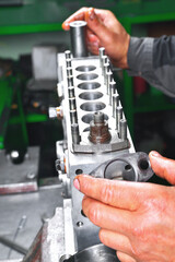 repair of fuel pump of eight-cylinder diesel engine installation of sections in pump body