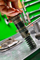repair of fuel pump of eight-cylinder diesel engine installation of sections in pump body