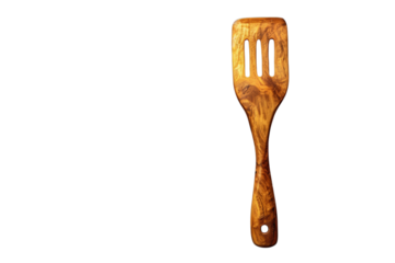 Wooden slotted spatula kitchen utensil for cooking and food preparation on transparent background