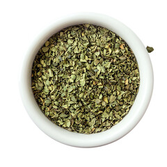 Dried chopped basil in white ceramic bowl Isolated transparent on white background