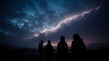 Dramatic lightning illuminates a dark twilight sky as silhouetted figures observe the powerful storm