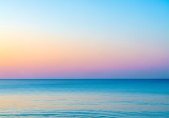 Serene seascape at dawn with pastel sky and calm azure water