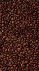 Roasted coffee beans spread densely across a flat surface creating a rich brown texture ideal for use as a warm food background or backdrop, surface, roasted beans, natural
