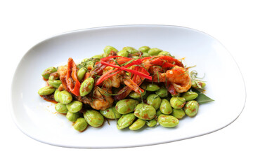 Delicious dish of cooked beans on a plate. The dish is adorned with red chili peppers