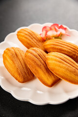Madeleine cookies sweet dessert traditional french sweets tasty snack fresh delicious gourmet food background on the table rustic top view copy space