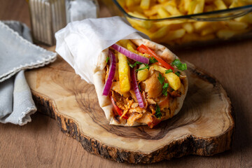 Greek chicken gyros wrapped in pita breads