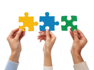 Three hands hold colorful puzzle pieces, symbolizing collaboration and problem-solving.