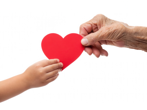A red heart is being exchanged between a child's hand and an elderly hand, symbolizing love and connection across generations.