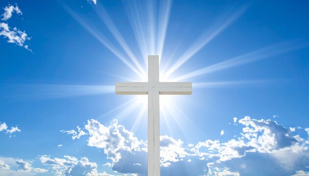 A radiant white cross against a backdrop of a bright blue sky and sun rays