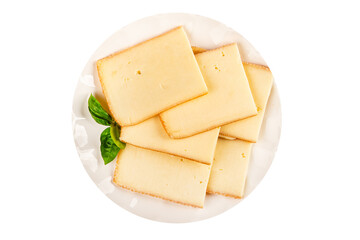 Raclette cheese portion slicing natural product tasty snack fresh delicious gourmet food background on the table rustic top view copy space