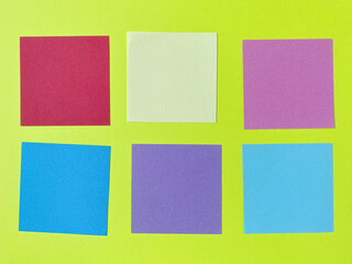 Blank empty multicolor note paper for copy space background. Stock photo.