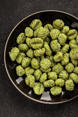 Gnocchi spinach potato dough second course portion size natural product tasty snack fresh delicious gourmet food background on the table rustic top view copy space