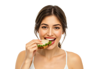 Woman happily eating sandwich, studio shot, food background