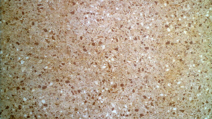Close up of beige terrazzo stone tile texture
