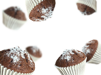 Flying chocolate cupcakes on white muffins	