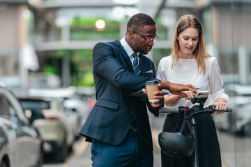 Two Professionals Commuting to Work by Sustainable Urban Transport