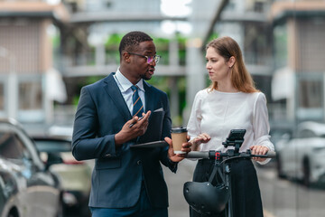 Two Professionals Commuting to Work by Sustainable Urban Transport