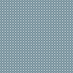 Intricate blue and white geometric pattern with repeating symmetry