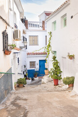 Houses in the narrow alleys of the white village Torrox, Spain, Andalusia