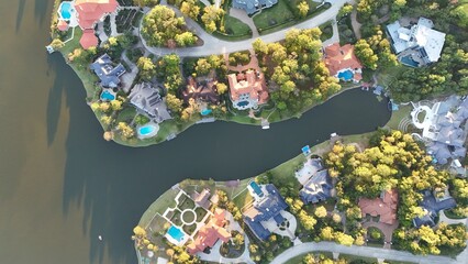 Aerial view of luxurious houses with swimming pool by Woodlands  lake, Houston,Texas