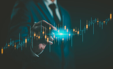 Business financial stock market concept. A Businessman analyzing graph financial data stock market. Business finance stock bar chart Hologram. Business success and growth, economic growth graph.