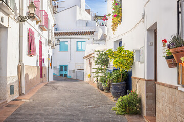 Houses in the narrow alleys of the white village Torrox, Spain, Andalusia