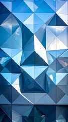 Geometric Blue Facade With Reflective Triangular Panels