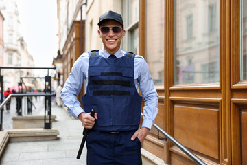 Portrait of police officer on city street
