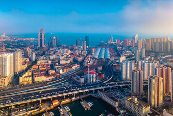 Obraz premium Urban Environment of Qingdao Railway Station and Jiaoning Elevated Road, China