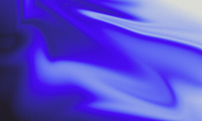 A soft blend of blue tones creates a smooth, grainy background that features gradient effects. The texture adds depth without any clear subject or focal point