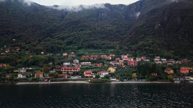 Village and mountain landscape along the shores of Lake Como. Onno city on Lake Como, Lombardy, Italy