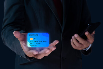 Businessman using smart phone and holding credit card for online financial transaction, Mobile banking, Bank payment, Shopping online.