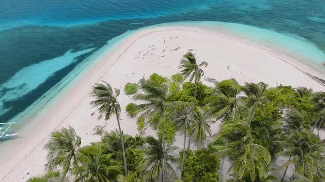 Aerial 4K, Patongong Island, Balabac, Philippines - White Sand Beach Paradise also known as Patunggong Island
pristine white sand beach completely surrounds the tropical island