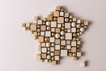 France Map Made of Wooden Blocks and Spheres, Representing French Geography in Abstract Form