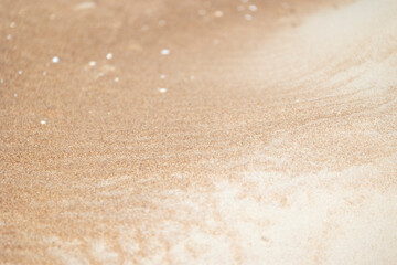 Beautiful sand patterns at the beach of Baltic Sea. Sunny summer evening in Latva.