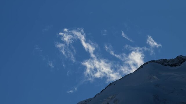 movement of clouds in the high mountains, time lapse, mountain, wind, Morterasch Glacier, Switzerland