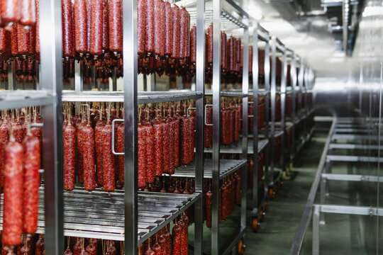 Smoked sausage production line in the factory