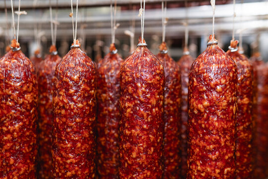 Smoked sausage production line in the factory