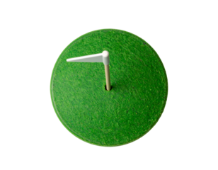 mini golf putting green circle with small white flag hole top view on isolated background