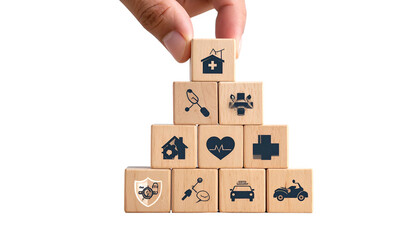 Hand stacking wooden blocks with health, home, and protection icons in a pyramid